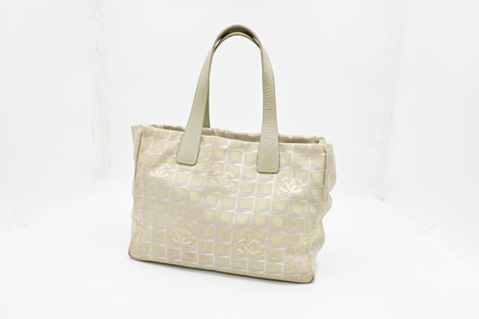 Chanel New Travel Line Tote in Champagne Canvas