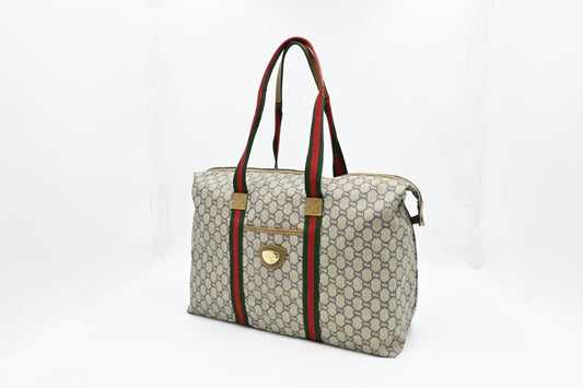 Gucci Plus Zipped Travel Bag in GG Plus Coated Canvas