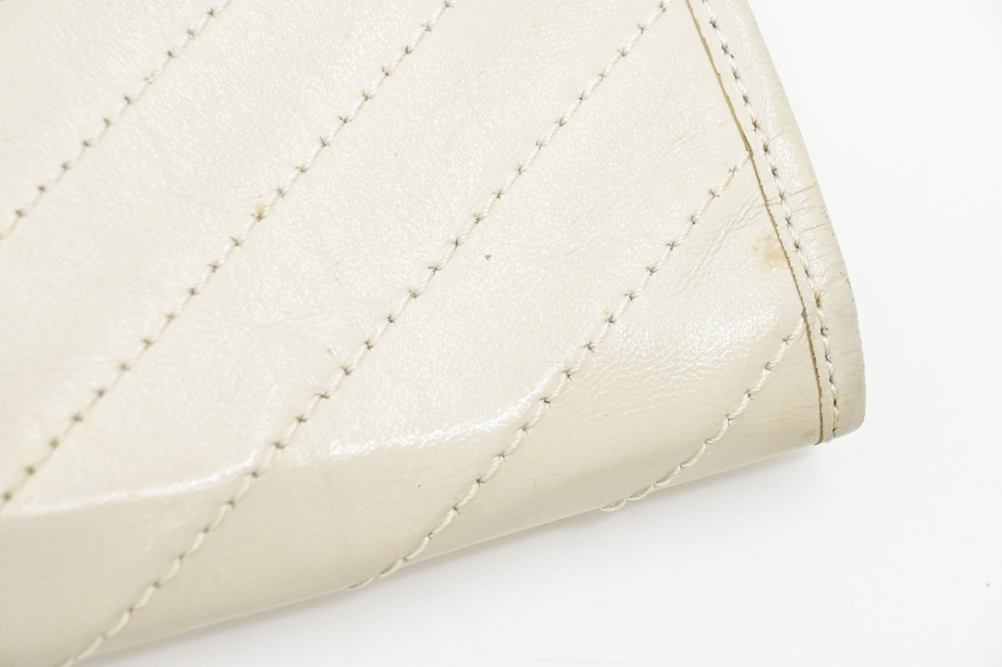 YSL Clutch in White Chevron Leather