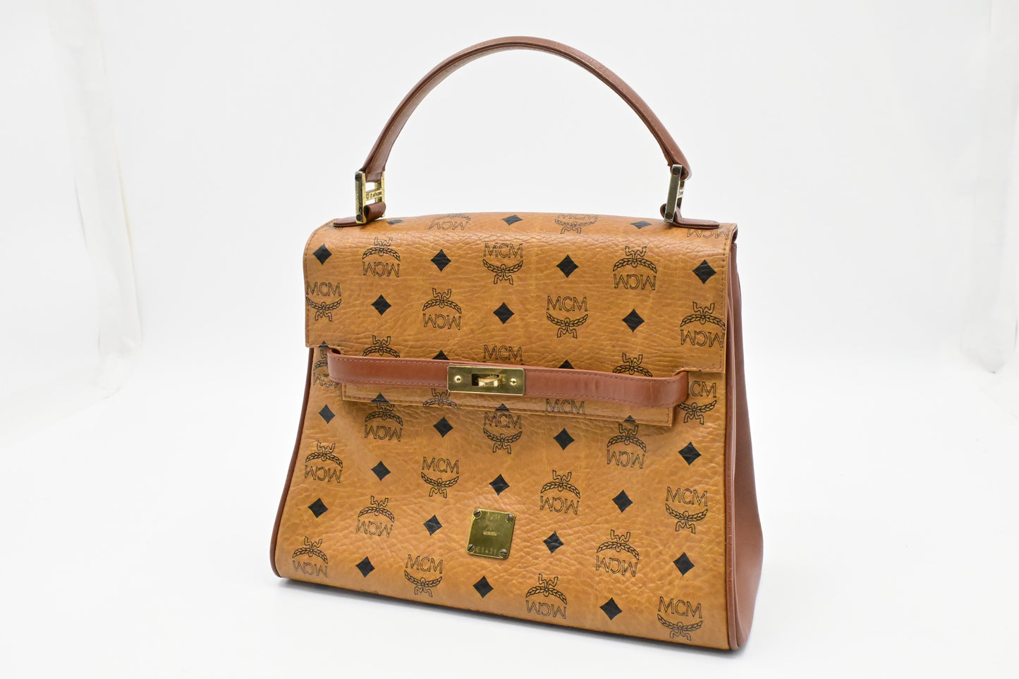 MCM Medium Kelly in Cognac Visetos Canvas