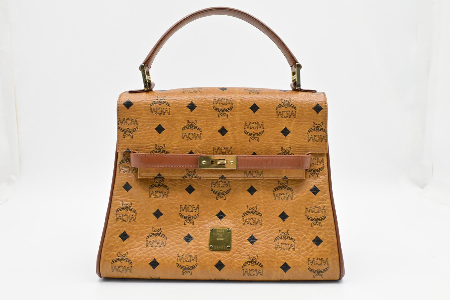 MCM Medium Kelly in Cognac Visetos Canvas