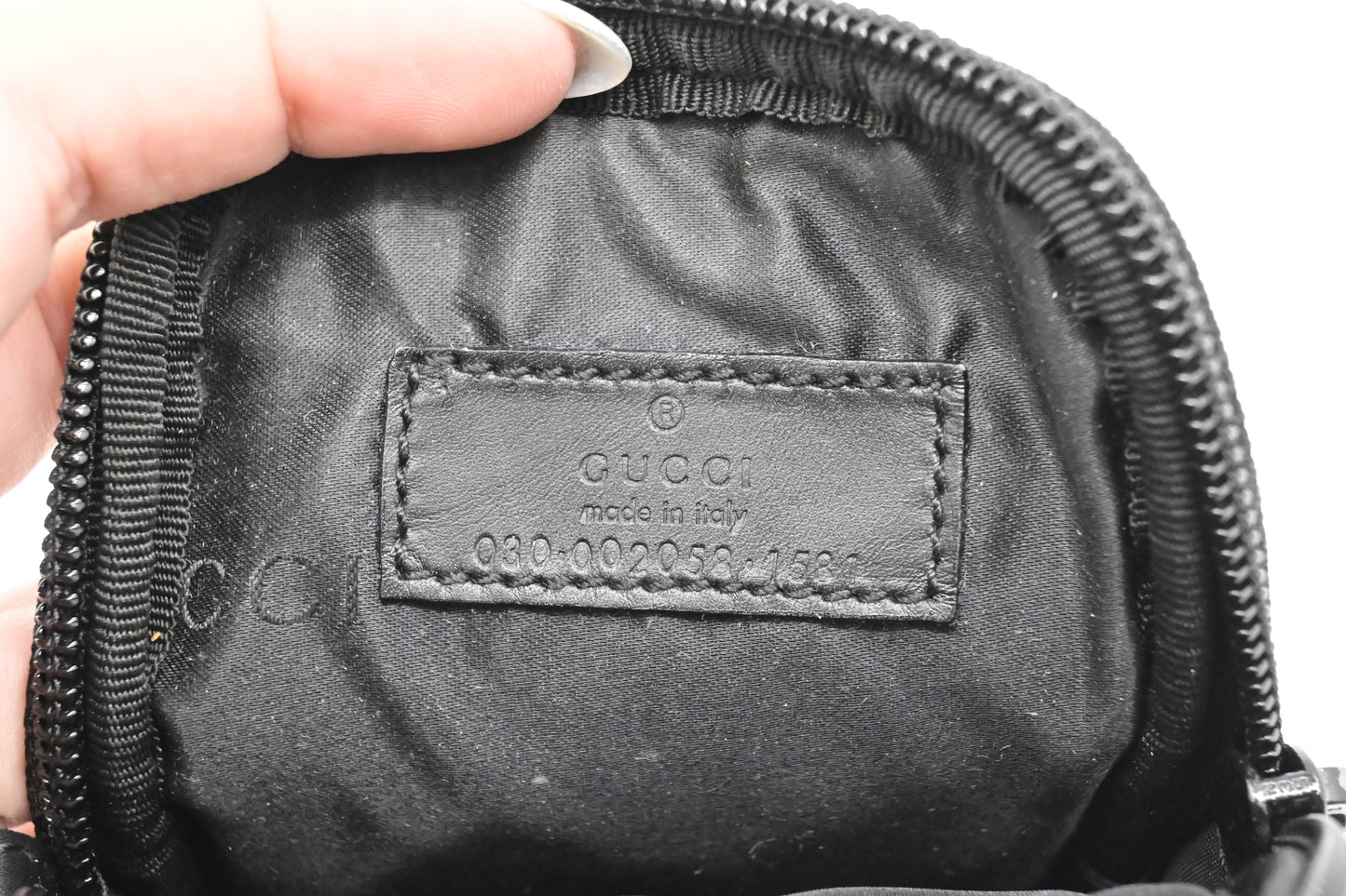 Gucci Mini Pouch in GG Black Canvas