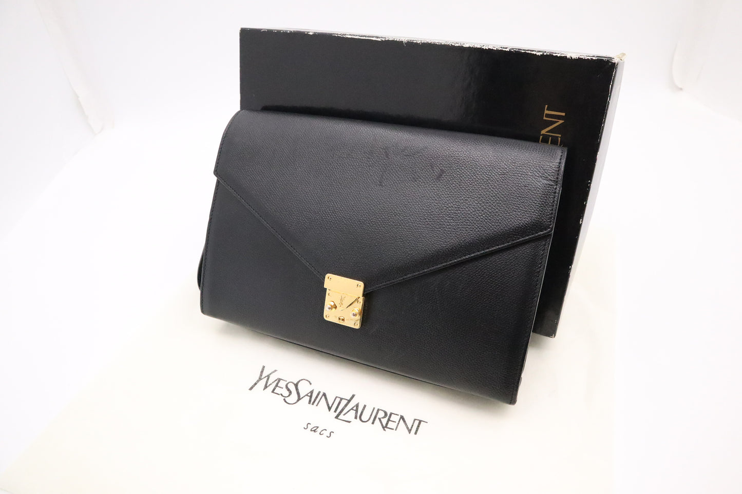 YSL Saint Laurent Clutch Bag in Black Cowhide Leather