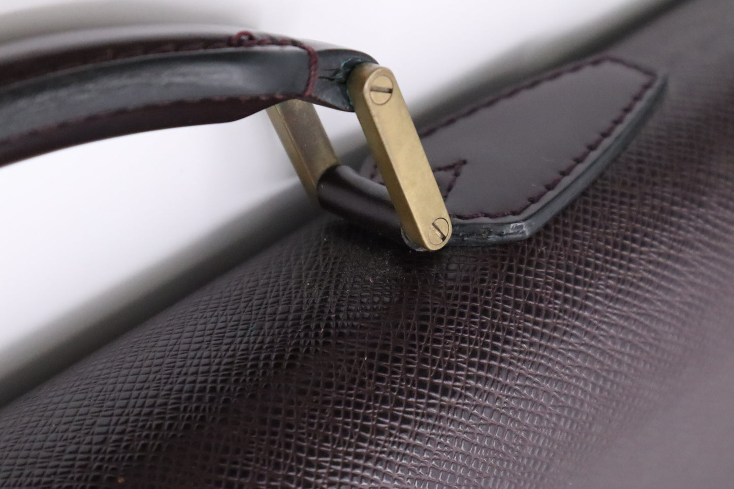 Louis Vuitton Serviette Moskova in Purple Taiga Leather