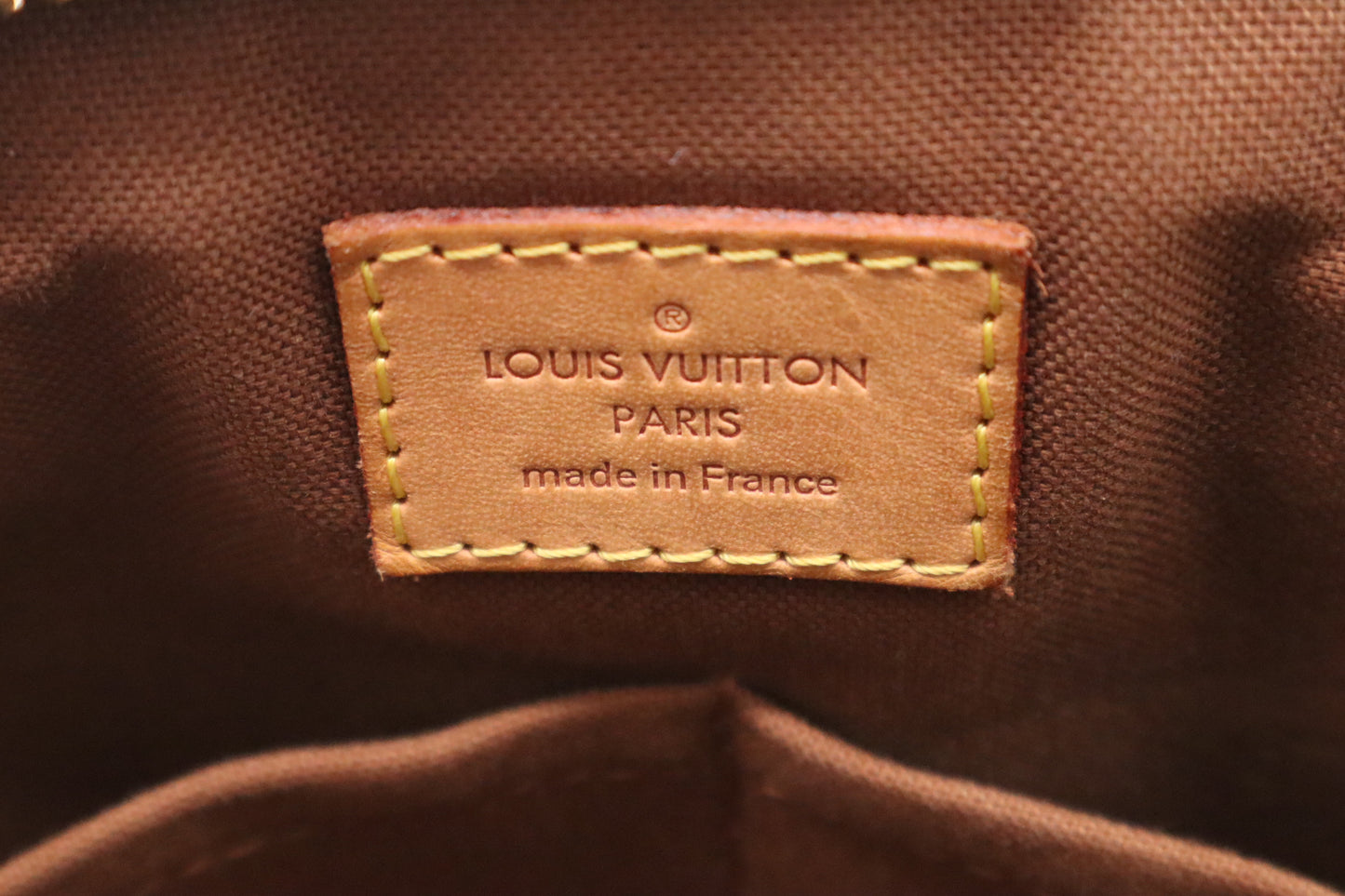 Louis Vuitton Tivoli PM in Monogram Canvas