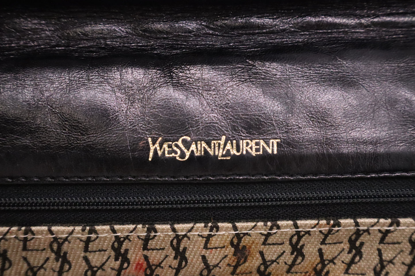 YSL Saint Laurent Clutch in Black Quilted Leather