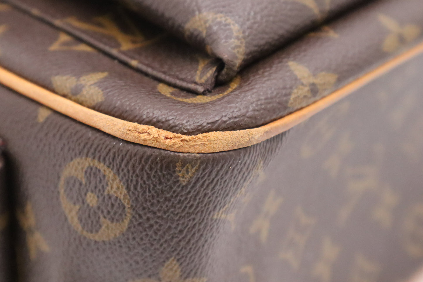 Louis Vuitton Multiple Cite in Monogram Canvas