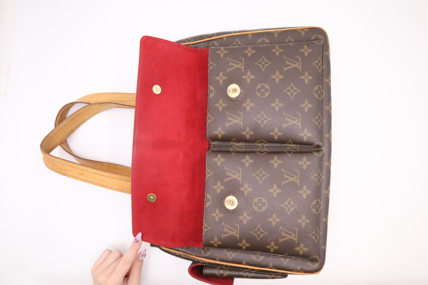 Louis Vuitton Multiple Cite in Monogram Canvas