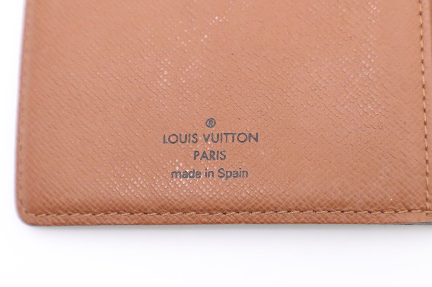 Louis Vuitton Vertical Bifold Wallet in Monogram Canvas