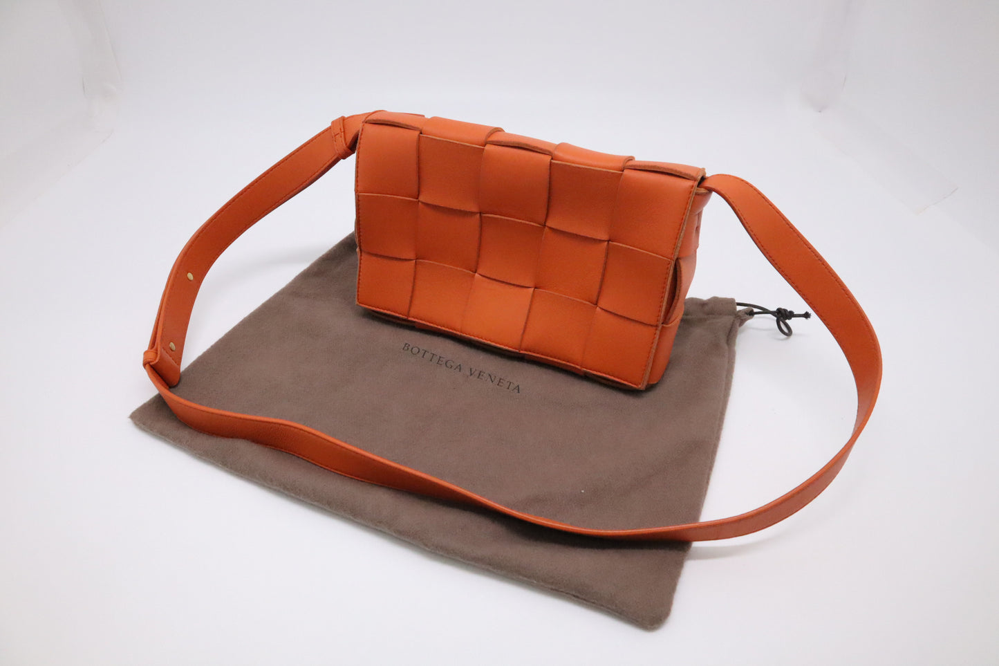 Bottega Veneta Cassette in Orange Intrecciato Leather