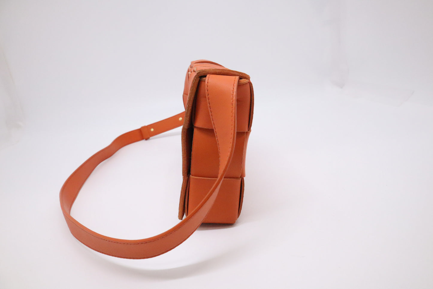 Bottega Veneta Cassette in Orange Intrecciato Leather