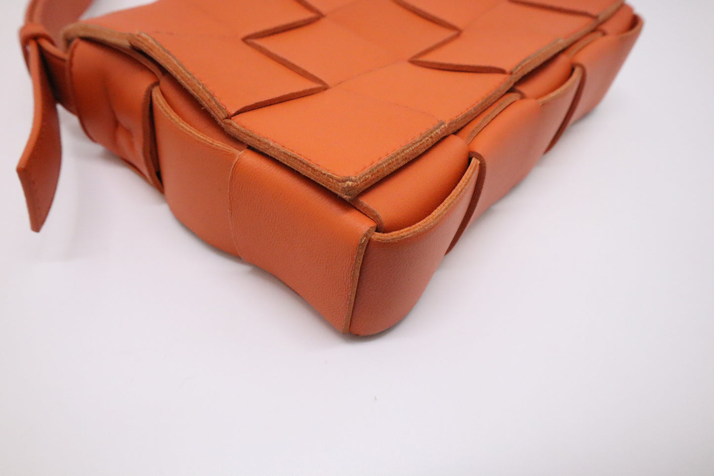 Bottega Veneta Cassette in Orange Intrecciato Leather