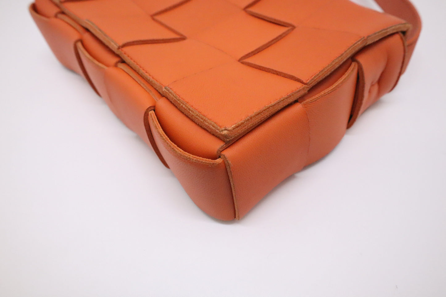 Bottega Veneta Cassette in Orange Intrecciato Leather