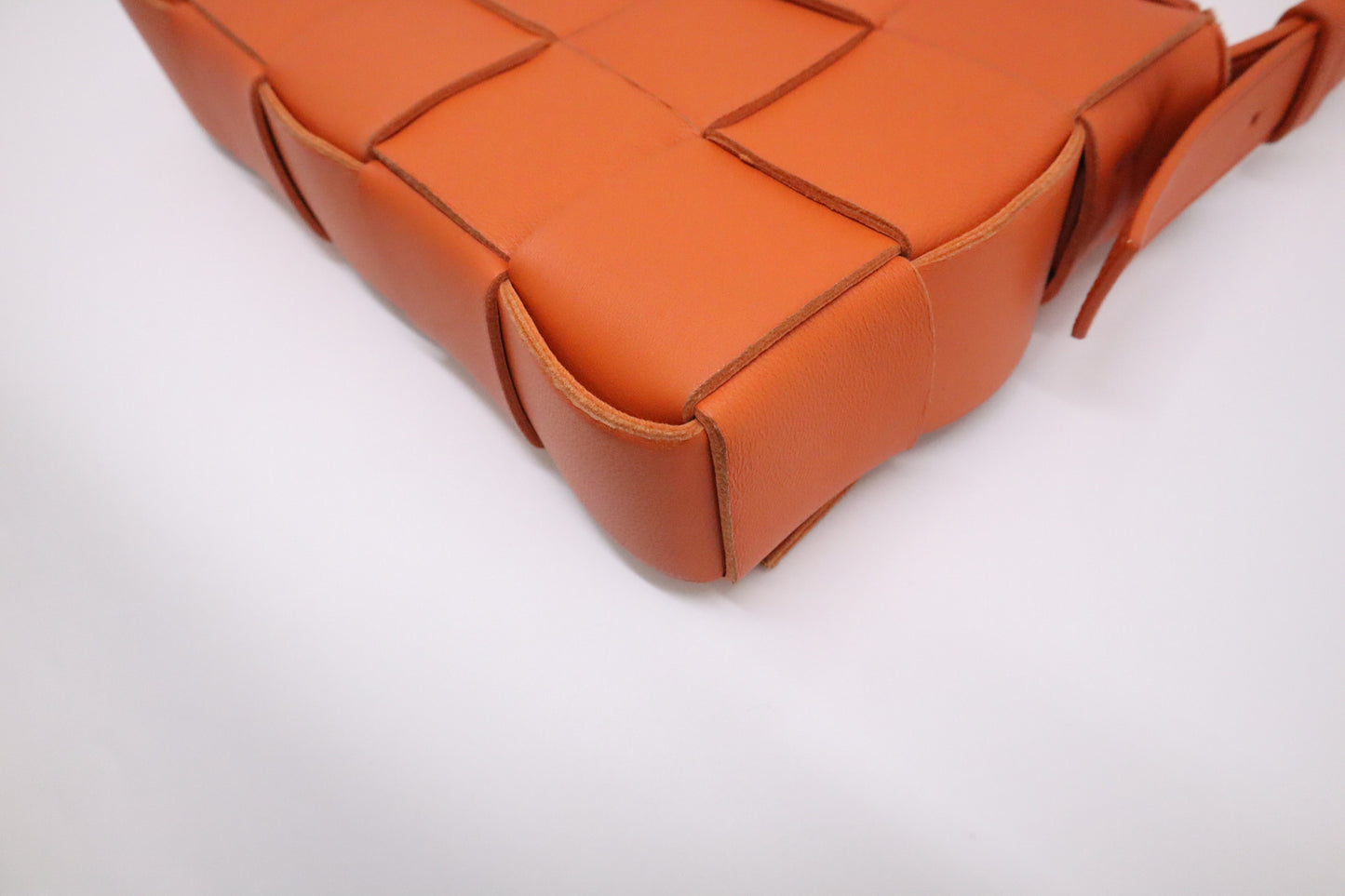 Bottega Veneta Cassette in Orange Intrecciato Leather