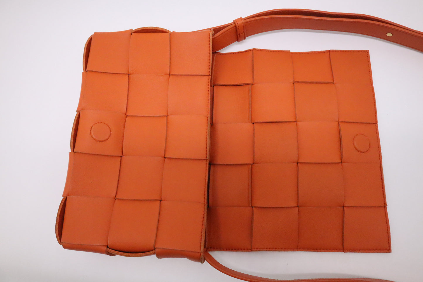 Bottega Veneta Cassette in Orange Intrecciato Leather