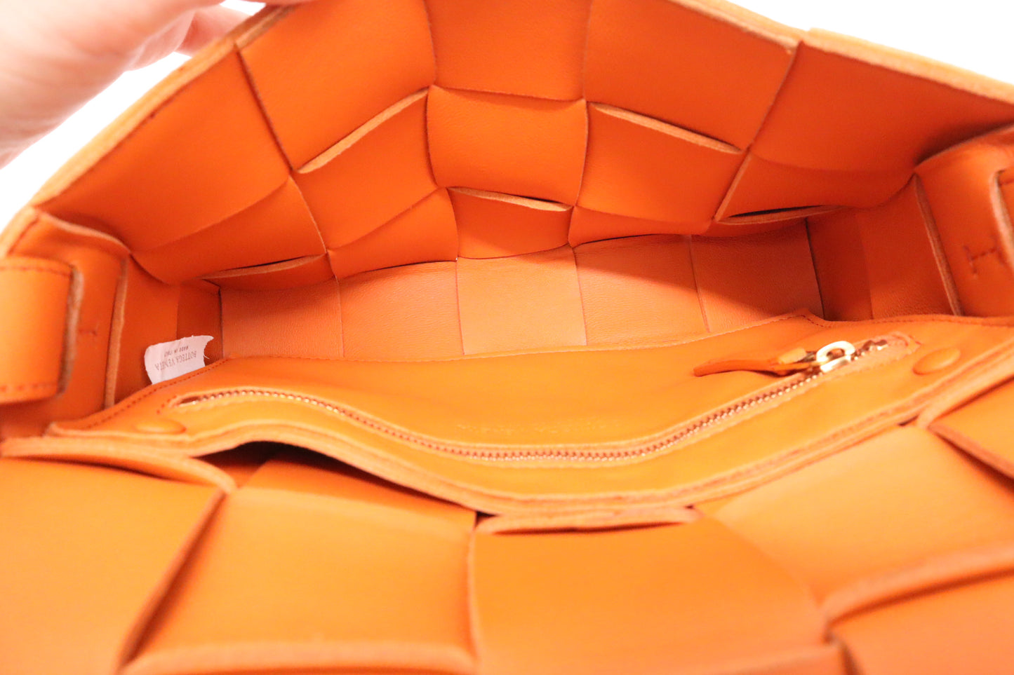 Bottega Veneta Cassette in Orange Intrecciato Leather