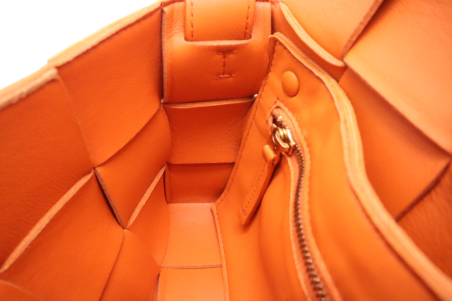 Bottega Veneta Cassette in Orange Intrecciato Leather