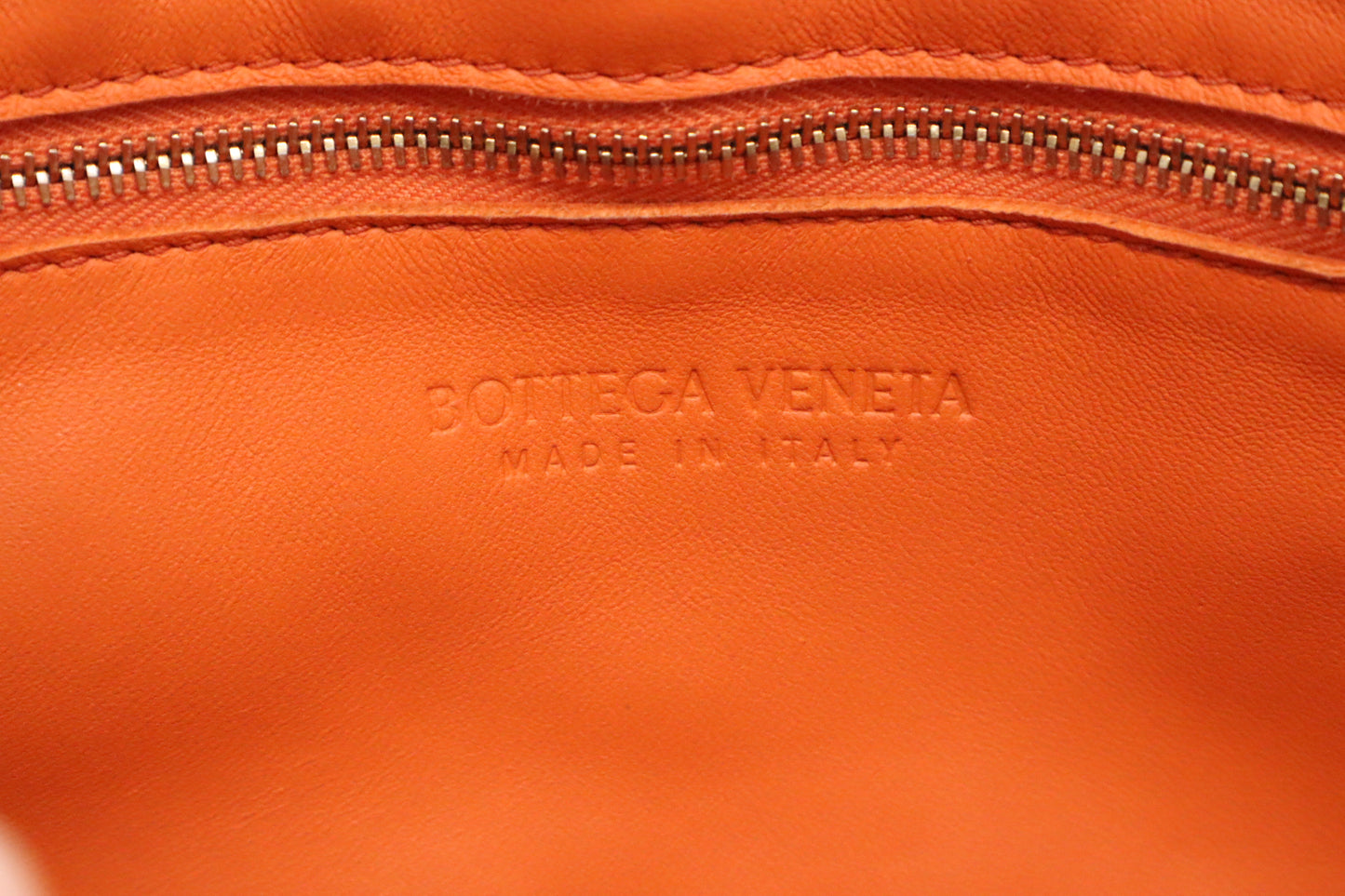 Bottega Veneta Cassette in Orange Intrecciato Leather