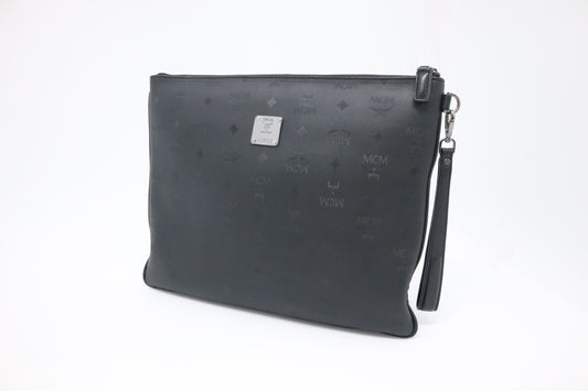 MCM Clutch Bag in Black Visetos Canvas and Leather